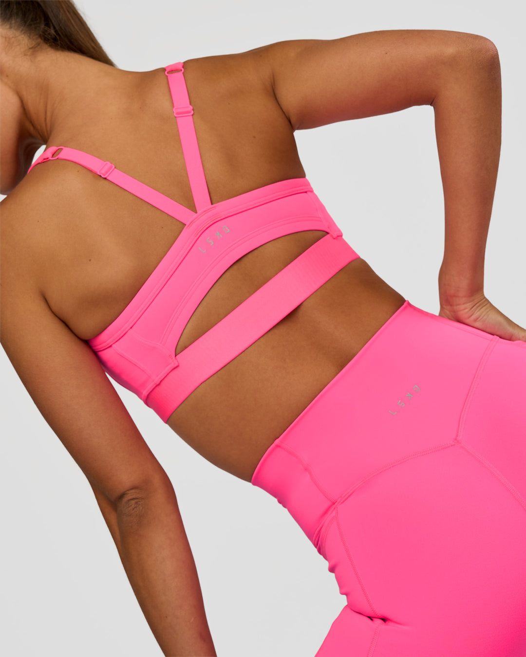 Woman wearing Momentum Corset Sports Bra - Sugar Plum | Model:Brylee | Size:XS - view 2