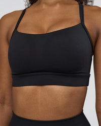 Woman wearing Momentum Sports Bra D/DD/E - Black | Model:Jordan | Size:XS | Thumbnail Index: 3