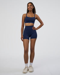Woman wearing Momentum Sports Bra D/DD/E - Future Navy | Model:Jordan | Size:XS | Thumbnail Index: 2