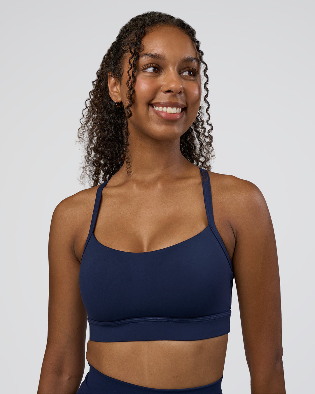 Woman wearing Momentum Sports Bra D/DD/E - Future Navy | Model:Jordan | Size:XS - view 1