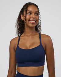 Woman wearing Momentum Sports Bra D/DD/E - Future Navy | Model:Jordan | Size:XS | Thumbnail Index: 0