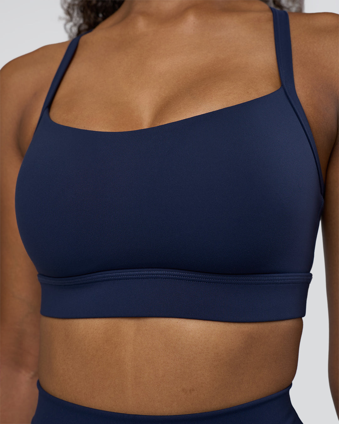 Woman wearing Momentum Sports Bra D/DD/E - Future Navy | Model:Jordan | Size:XS - view 4