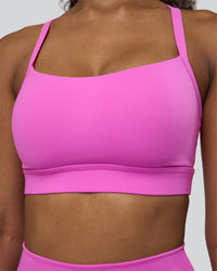 Woman wearing Momentum Sports Bra D/DD/E - Ultra Fuchsia | Model:Jordan | Size:XS | Thumbnail Index: 3