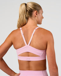 Woman wearing Momentum Sports Bra - Marshmallow | Model:Emelia | Size:XS | Thumbnail Index: 1