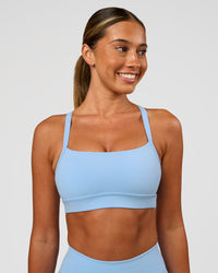 Woman wearing Momentum Sports Bra - Open Air | Model:Charli | Size:XS | Thumbnail Index: 5