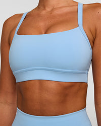 Woman wearing Momentum Sports Bra - Open Air | Model:Charli | Size:XS | Thumbnail Index: 7