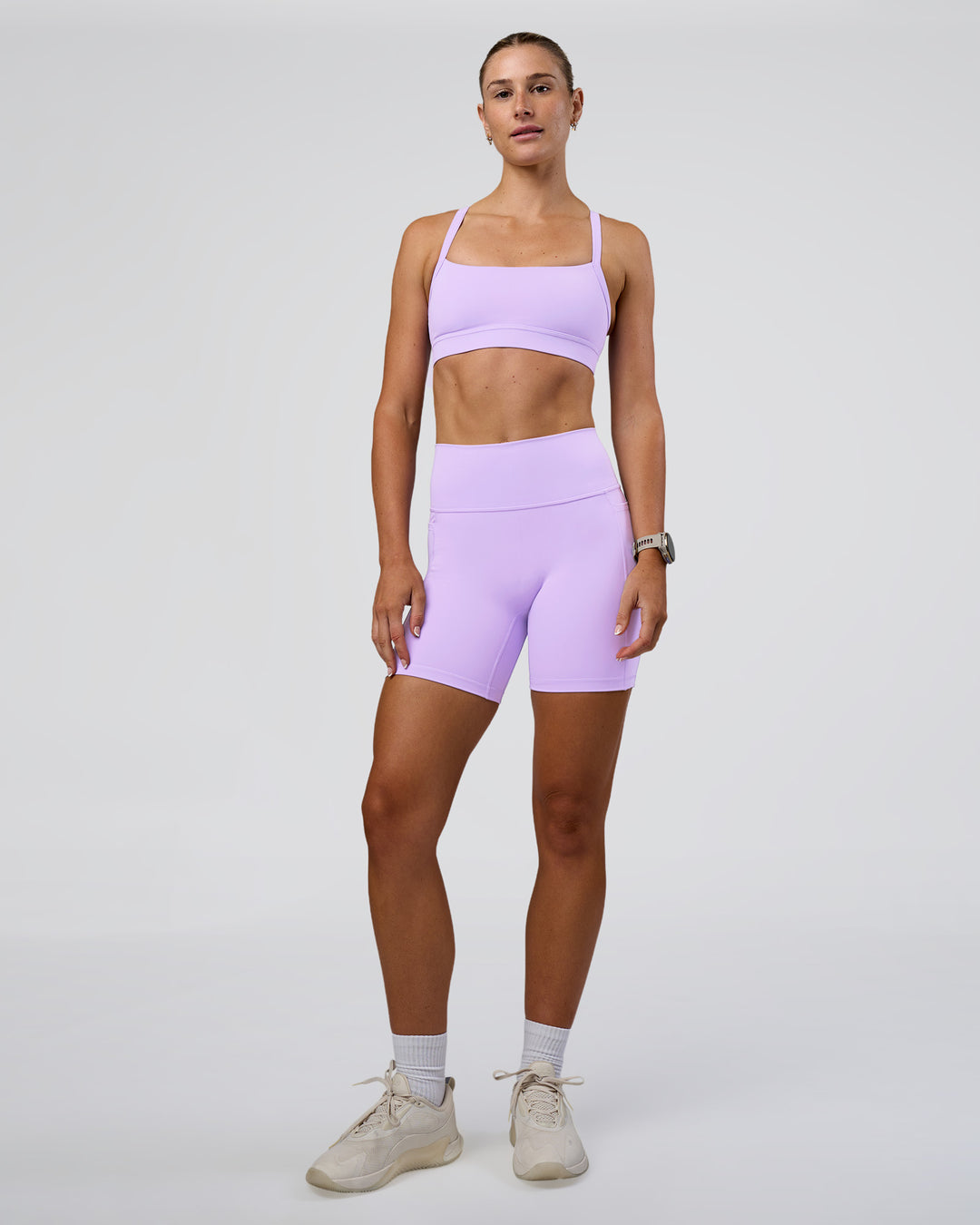Woman wearing Momentum Sports Bra - Pale Lilac | Model:Emelia | Size:XS - view 4
