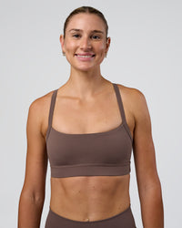 Woman wearing Momentum Sports Bra - Peppercorn | Model:Peppercorn | Size:XS | Thumbnail Index: 2