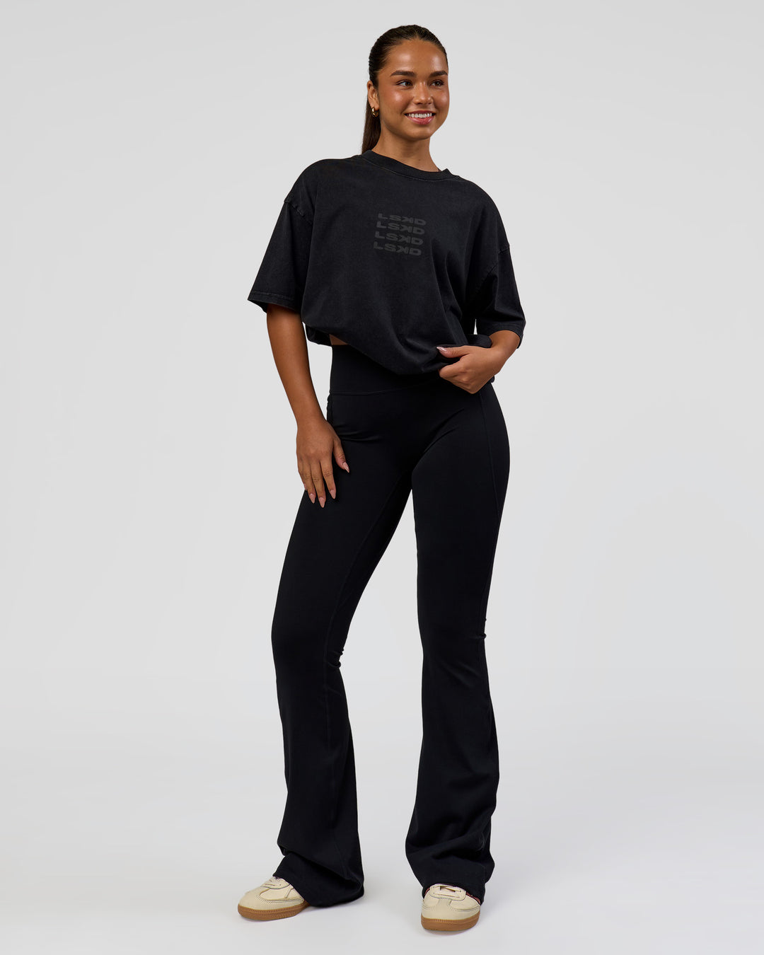 Woman wearing Move Fast Heavyweight Oversized Tee - Black Washed | Model:Sophia | Size:XS - view 5