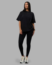 Woman wearing Move Fast Washed Heavyweight Tee Oversize - Black-Island Paradise | Model:Rhiley | Size:XS | Thumbnail Index: 7