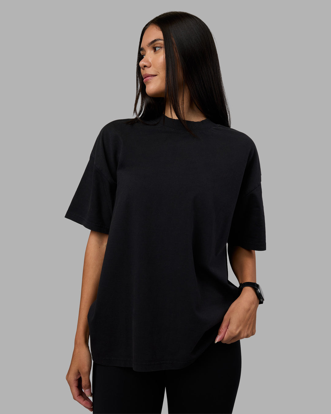 Woman wearing Move Fast Washed Heavyweight Tee Oversize - Black-Island Paradise | Model:Rhiley | Size:XS - view 5