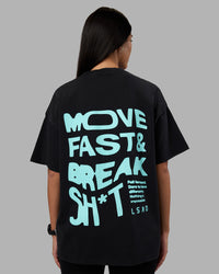 Woman wearing Move Fast Washed Heavyweight Tee Oversize - Black-Island Paradise | Model:Rhiley | Size:XS | Thumbnail Index: 8