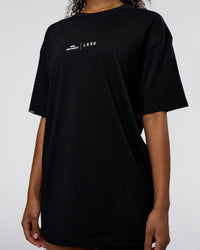 Woman wearing Movember 2025 FLXCotton Oversize Tee - Black | Model:Jordan | Size:XS | Thumbnail Index: 10