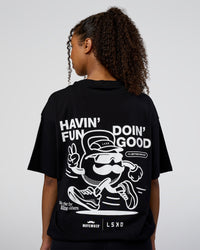 Woman wearing Movember 2025 FLXCotton Oversize Tee - Black | Model:Jordan | Size:XS | Thumbnail Index: 3
