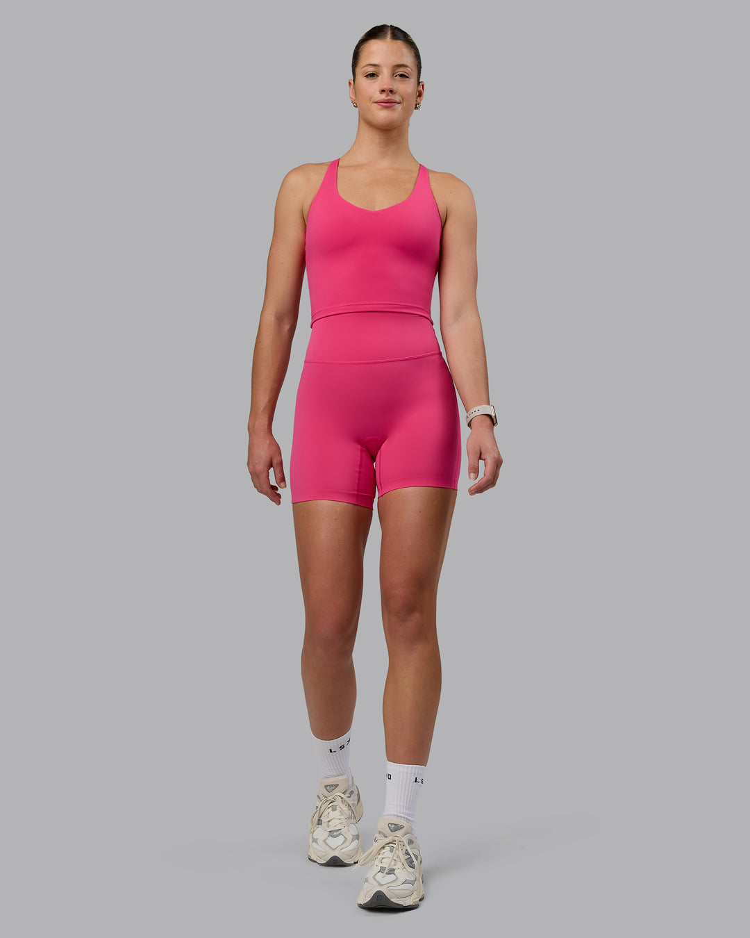 Woman wearing Movement Active Tank - Pink Flash - view 6