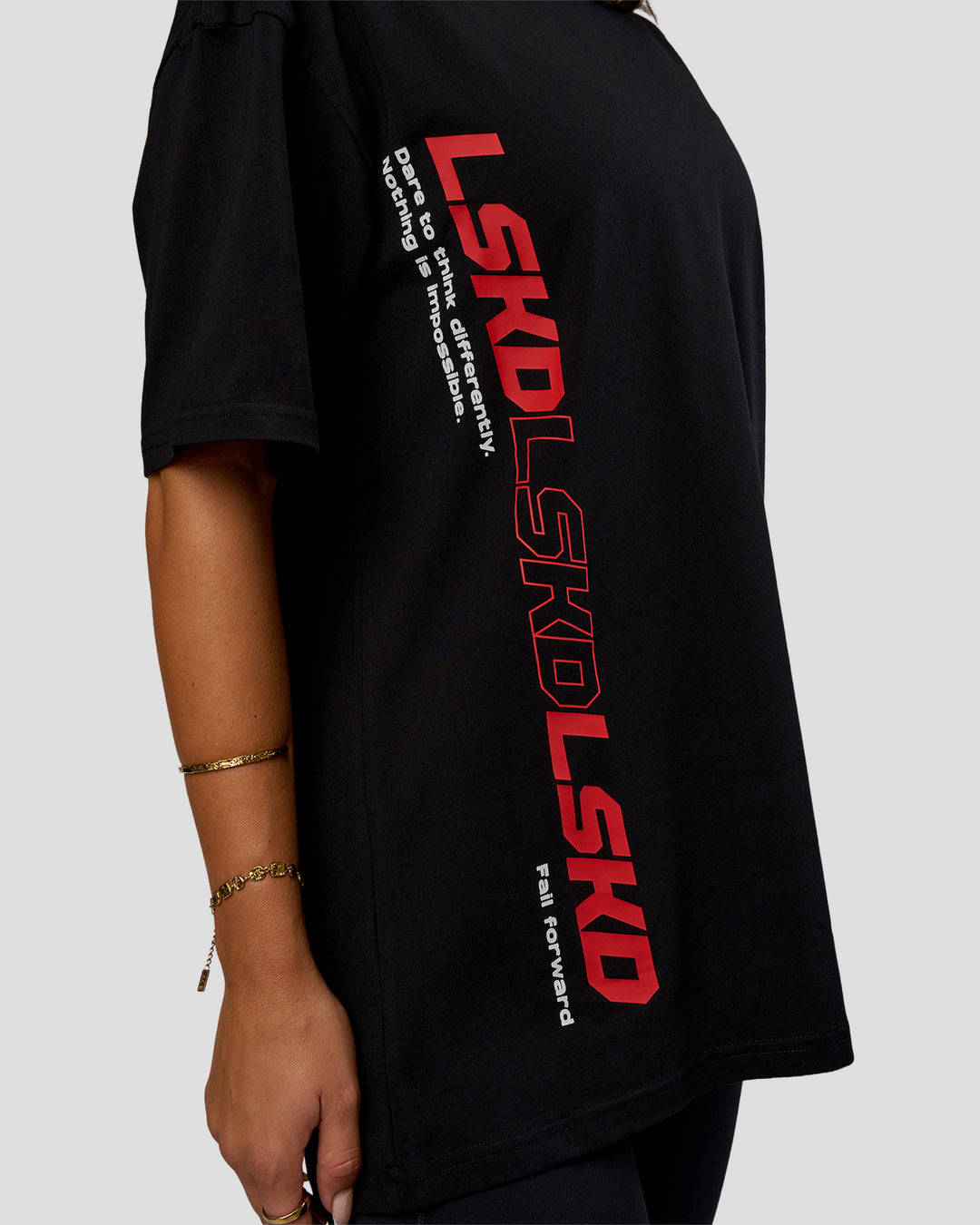 Woman wearing Nothing Is Impossible FLXCotton Oversized Tee - Black-Flame | Model:Bianca | Size:XS - view 5