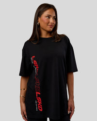 Woman wearing Nothing Is Impossible FLXCotton Oversized Tee - Black-Flame | Model:Bianca | Size:XS | Thumbnail Index: 3