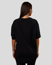 Woman wearing Nothing Is Impossible FLXCotton Oversized Tee - Black-Flame | Model:Bianca | Size:XS | Thumbnail Index: 8
