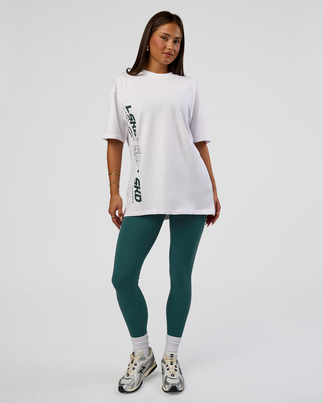 Woman wearing Nothing Is Impossible FLXCotton Oversized Tee - White-Vital Green | Model:Bianca | Size:XS - view 13