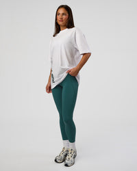 Woman wearing Nothing Is Impossible FLXCotton Oversized Tee - White-Vital Green | Model:Bianca | Size:XS | Thumbnail Index: 9