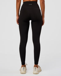 Woman wearing O.G Fusion Ultra High-Rise Full Length Legging Pockets - Black | Model:Charli | Size:XS | Thumbnail Index: 7