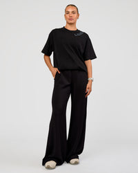 Woman wearing Offset Heavyweight Unisex Oversized Tee - Black Washed-Castlerock | Model:Maja | Size:XS | Thumbnail Index: 8