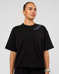 Woman wearing Offset Heavyweight Unisex Oversized Tee - Black Washed-Castlerock | Model:Maja | Size:XS | Thumbnail Index: 3