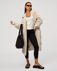 Woman wearing On the Move Trench Coat - Shale Beige | Model:Brylee | Size:XS | Thumbnail Index: 13