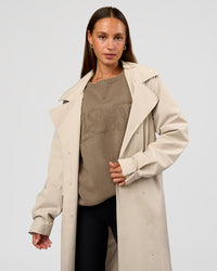 Woman wearing On the Move Trench Coat - Shale Beige | Model:Brylee | Size:XS | Thumbnail Index: 10