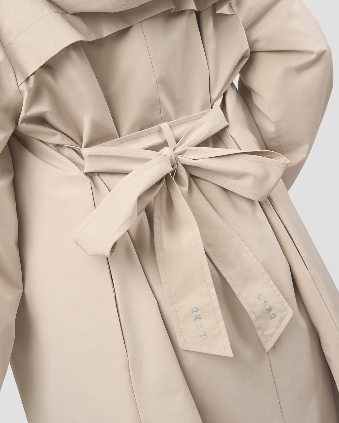 Woman wearing On the Move Trench Coat - Shale Beige | Model:Brylee | Size:XS - view 3
