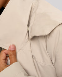 Woman wearing On the Move Trench Coat - Shale Beige | Model:Brylee | Size:XS | Thumbnail Index: 5