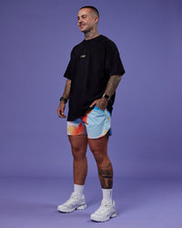 Man wearing Our Journey Heavyweight Oversized Tee - Black-Rainbow | Model:Tayden | Size:XS | Thumbnail Index: 6