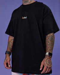 Man wearing Our Journey Heavyweight Oversized Tee - Black-Rainbow | Model:Tayden | Size:XS | Thumbnail Index: 10