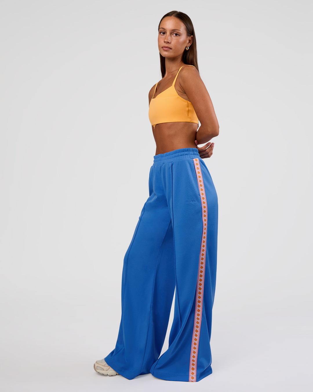 Woman wearing Peaches Track Pant - Palace Blue | Model:Brylee | Size:XS - view 6
