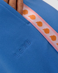 Woman wearing Peaches Track Pant - Palace Blue | Model:Brylee | Size:XS | Thumbnail Index: 1