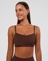 Woman wearing Peaches Wrap Sports Bra - Hot Chocolate | Model:Brylee | Size:XS | Thumbnail Index: 1