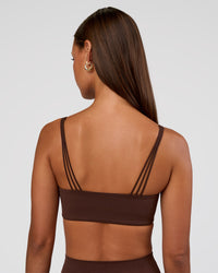 Woman wearing Peaches Wrap Sports Bra - Hot Chocolate | Model:Brylee | Size:XS | Thumbnail Index: 2