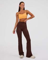 Woman wearing Peaches Wrap Sports Bra - Warm Apricot | Model:Brylee | Size:XS | Thumbnail Index: 6
