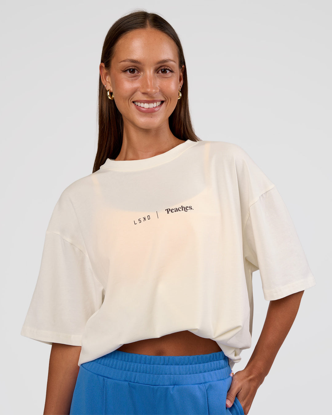 Woman wearing Peaches x LSKD Collection FLXCotton Oversize Tee - Off White | Model:Brylee | Size:XS - view 3