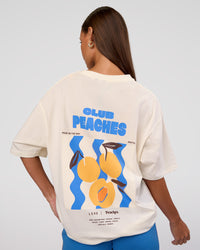 Woman wearing Peaches x LSKD Collection FLXCotton Oversize Tee - Off White | Model:Brylee | Size:XS | Thumbnail Index: 12
