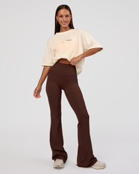 Woman wearing Peaches x LSKD Collection FLXCotton Oversize Tee - Off White | Model:Brylee | Size:XS | Thumbnail Index: 5