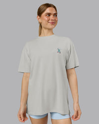Woman wearing Perspective FLXCotton Oversized Tee - Digital Mist-White | Model:Emilie | Size:XS | Thumbnail Index: 2