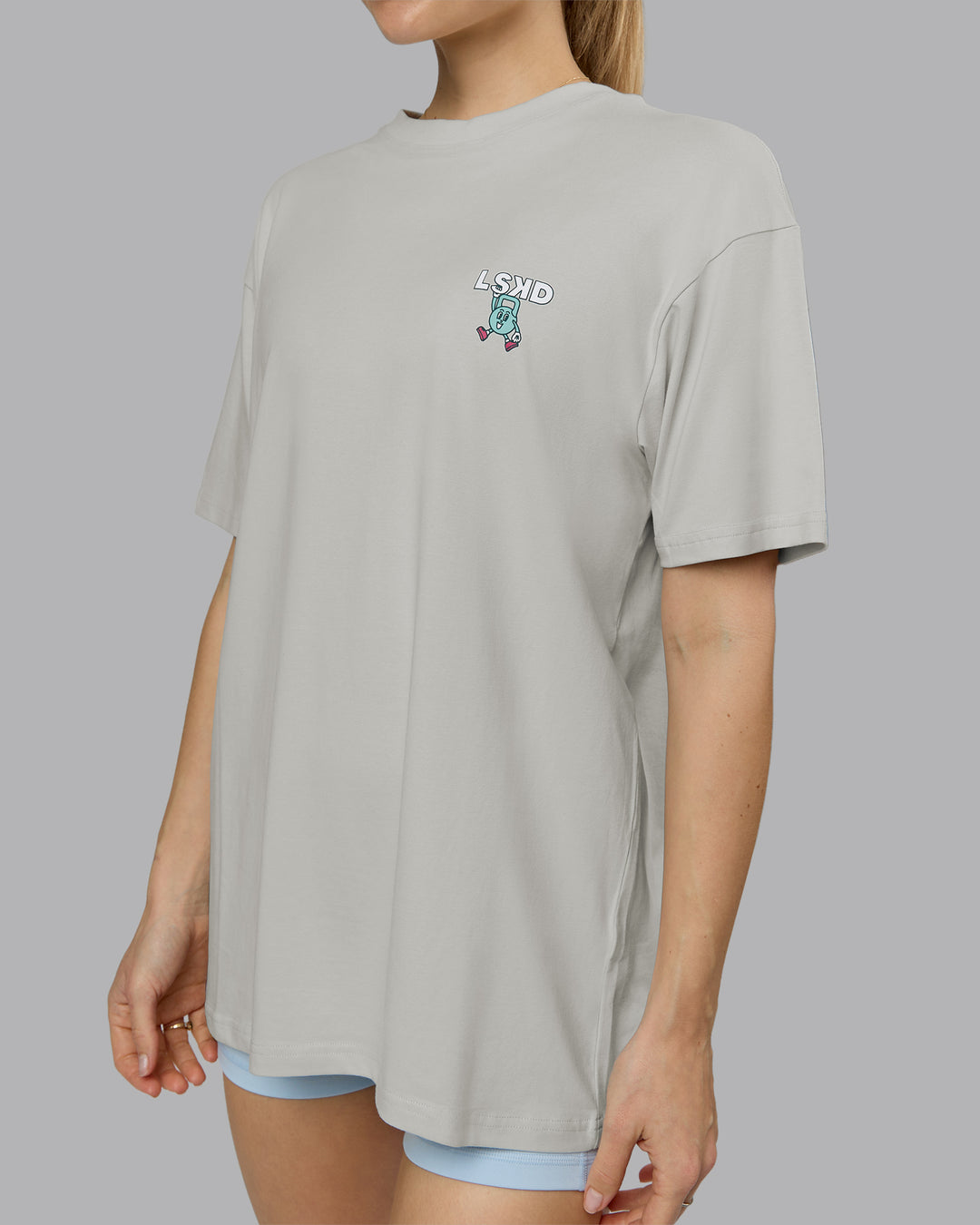 Woman wearing Perspective FLXCotton Oversized Tee - Digital Mist-White | Model:Emilie | Size:XS - view 8