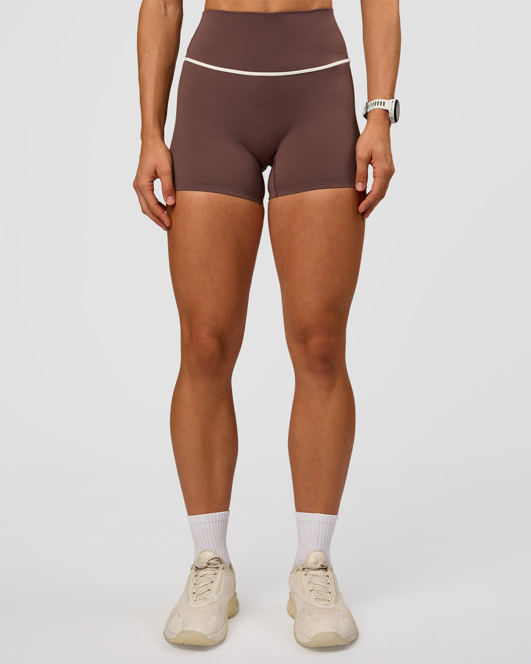 Woman wearing Pinnacle High-Rise 4" Short - Cocoa Powder-Off White | Model:Maja | Size:XS - view 1