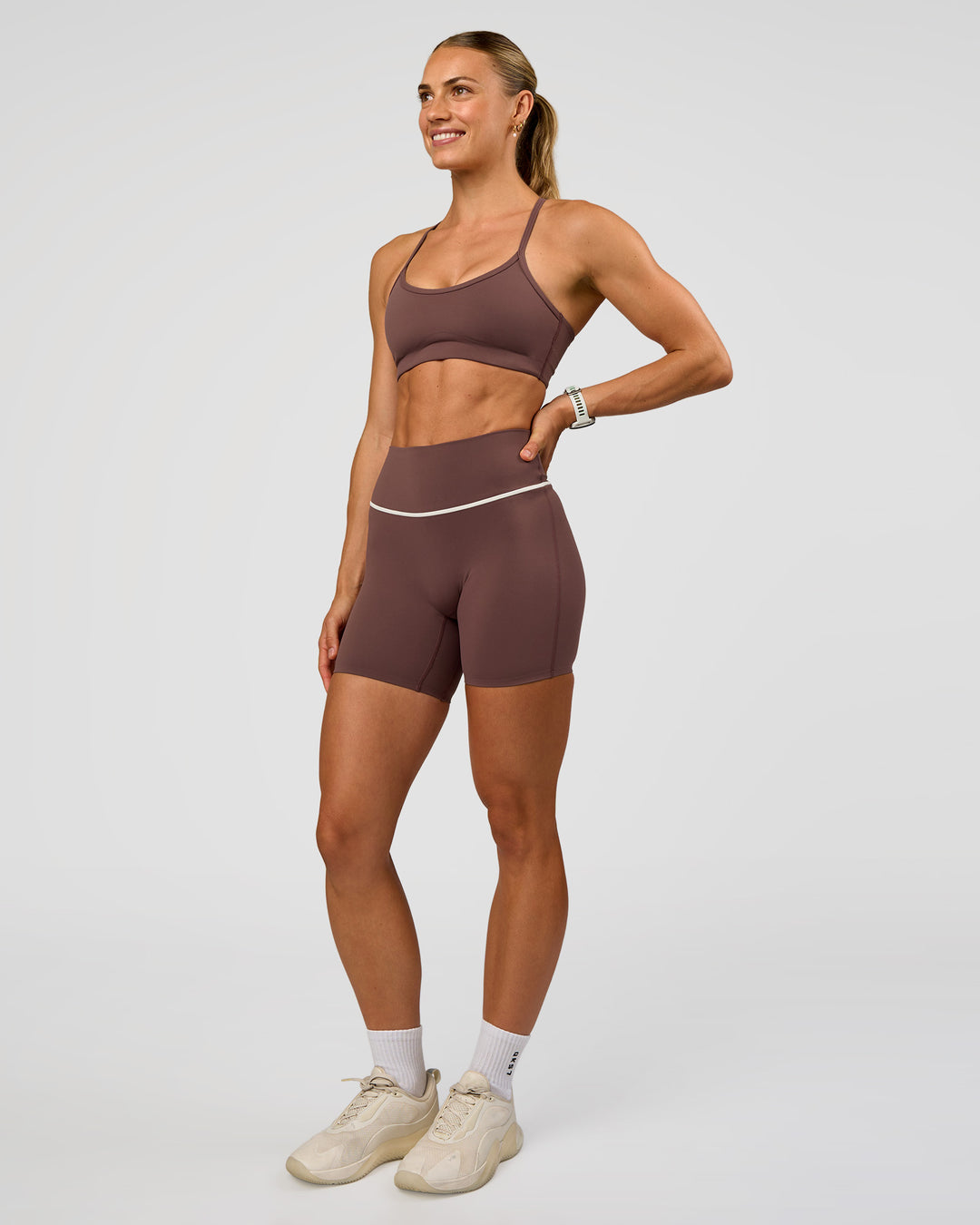 Woman wearing Pinnacle High-Rise 6" Short - Cocoa Powder-Off White | Model:Maja | Size:XS - view 6