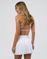 Woman wearing Precision Active Skirt - White | Model:Leilani | Size:XS | Thumbnail Index: 8