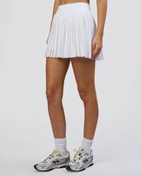 Woman wearing Precision Active Skirt - White | Model:Leilani | Size:XS | Thumbnail Index: 6