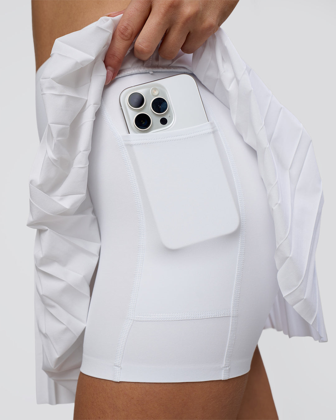 Woman wearing Precision Active Skirt - White | Model:Leilani | Size:XS - view 6