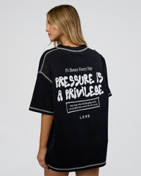 Woman wearing Pressure is Privilege Oversized Tee - Black-White | Model:Leilani | Size:XS | Thumbnail Index: 4
