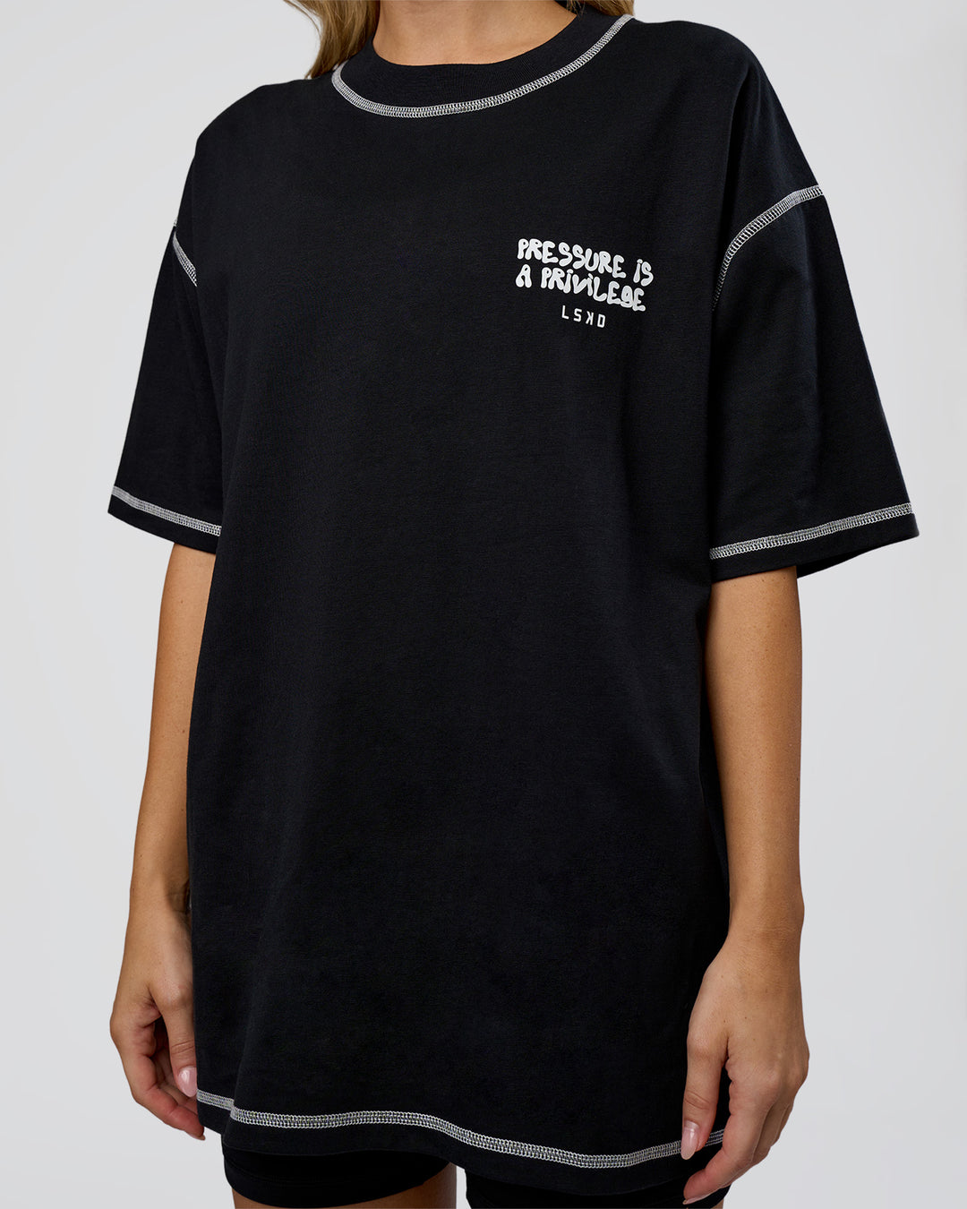 Woman wearing Pressure is Privilege Oversized Tee - Black-White | Model:Leilani | Size:XS - view 9